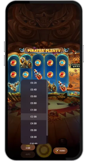 Tapping the Stake button and selecting a wager between £0.20 and £100 per spin in Pirates Plenty slot